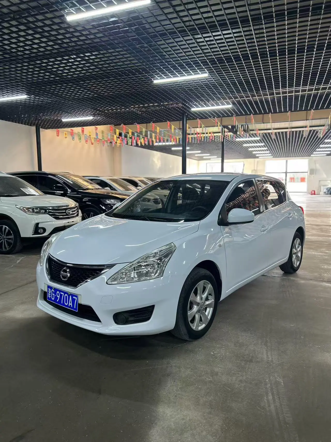 Nissan Tiida  из Китая