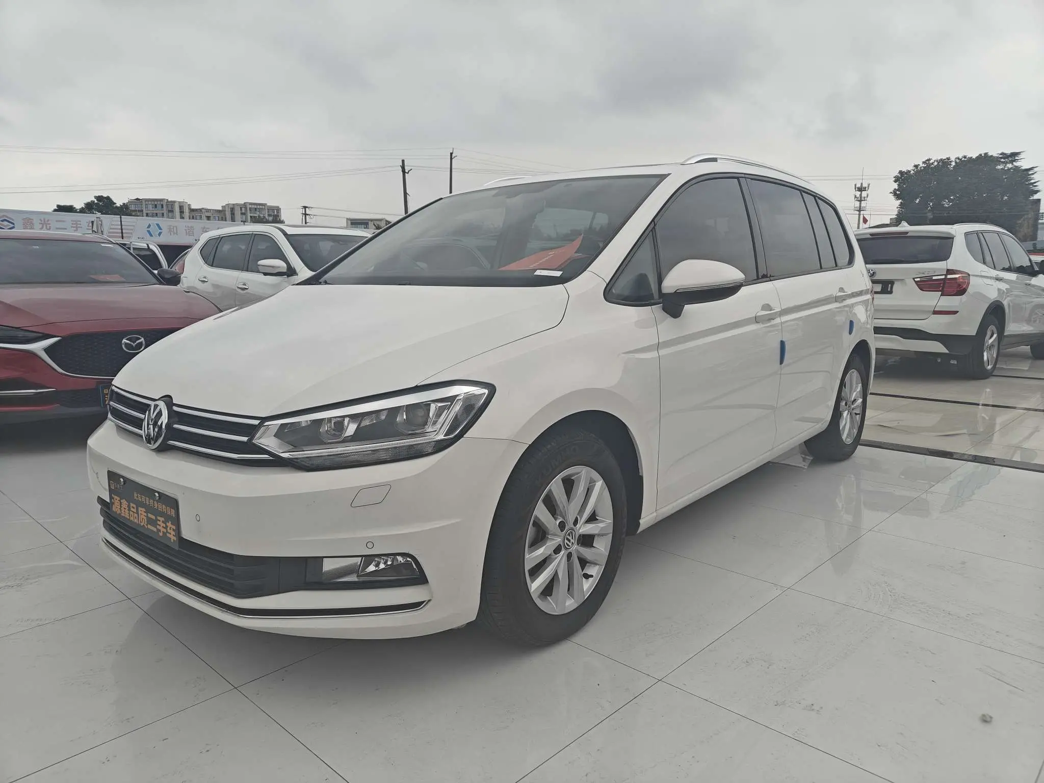 Volkswagen Touran L  из Китая