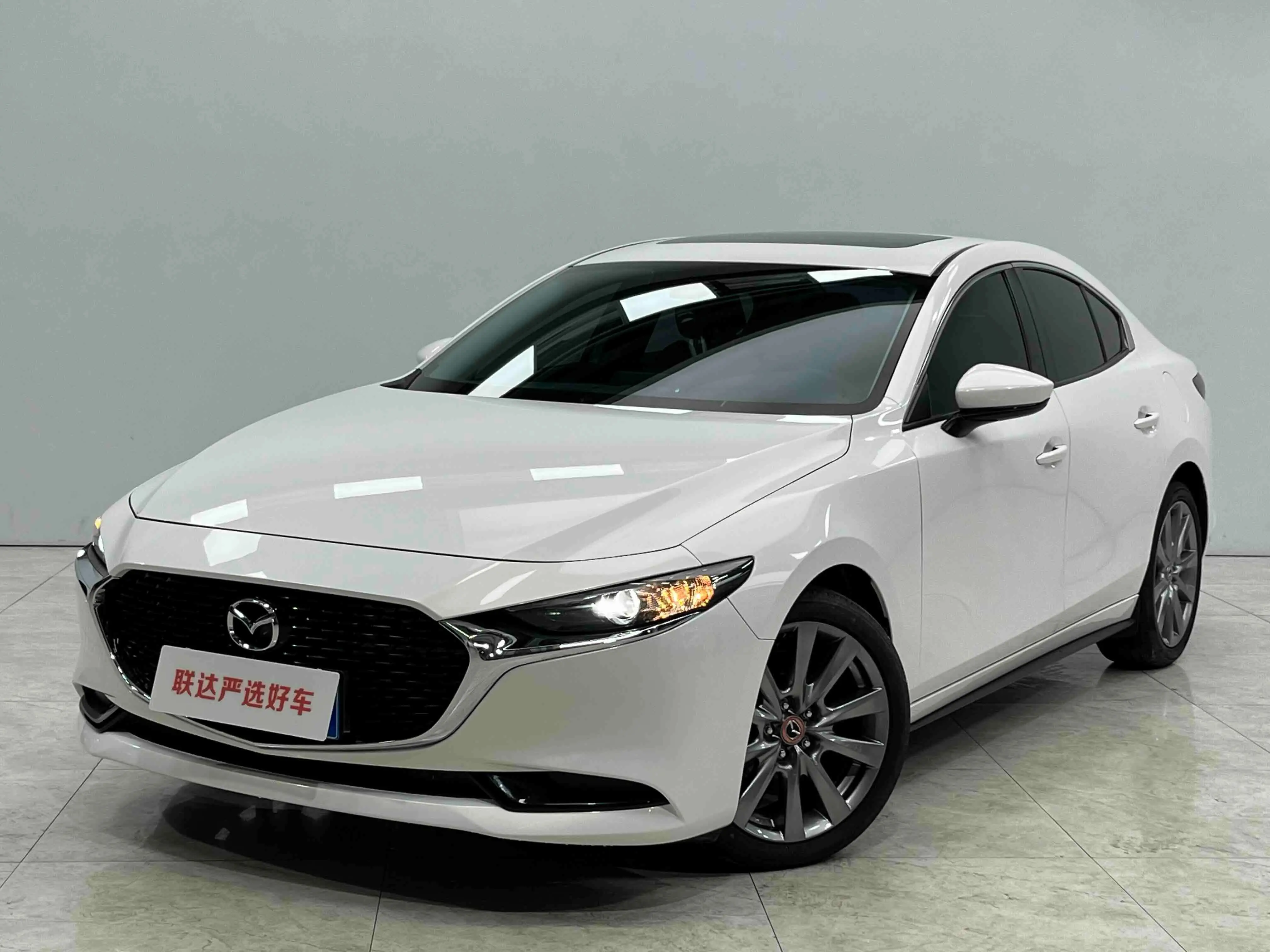 Mazda Axela (Mazda3)  из Китая