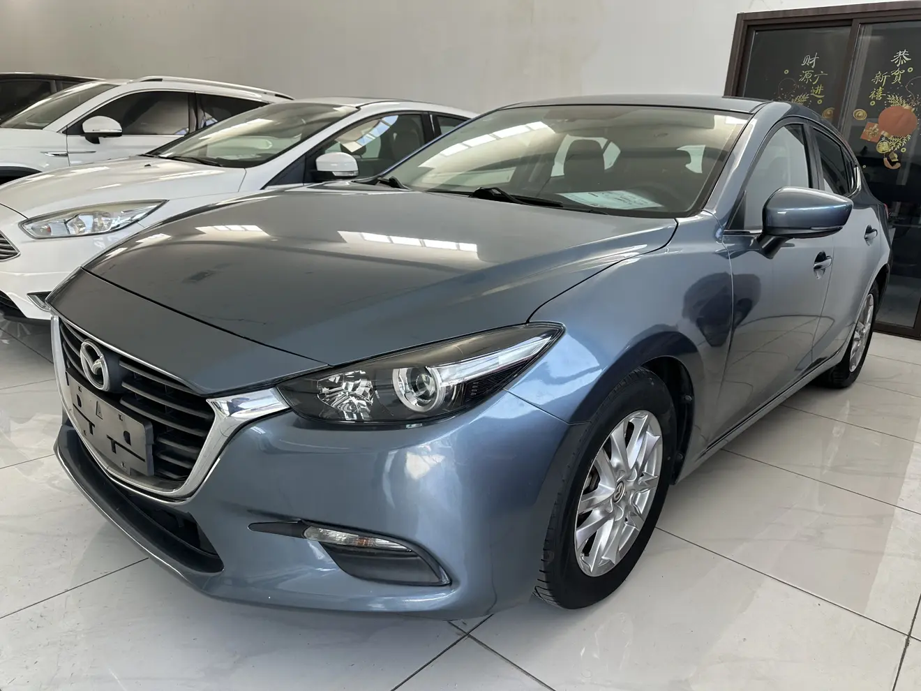 Mazda Axela (Mazda3)  из Китая