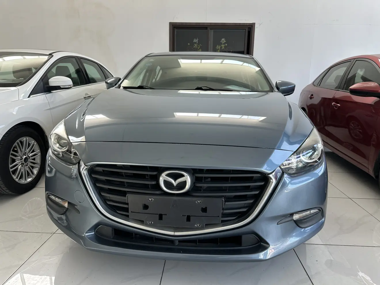 Mazda Axela (Mazda3)  из Китая