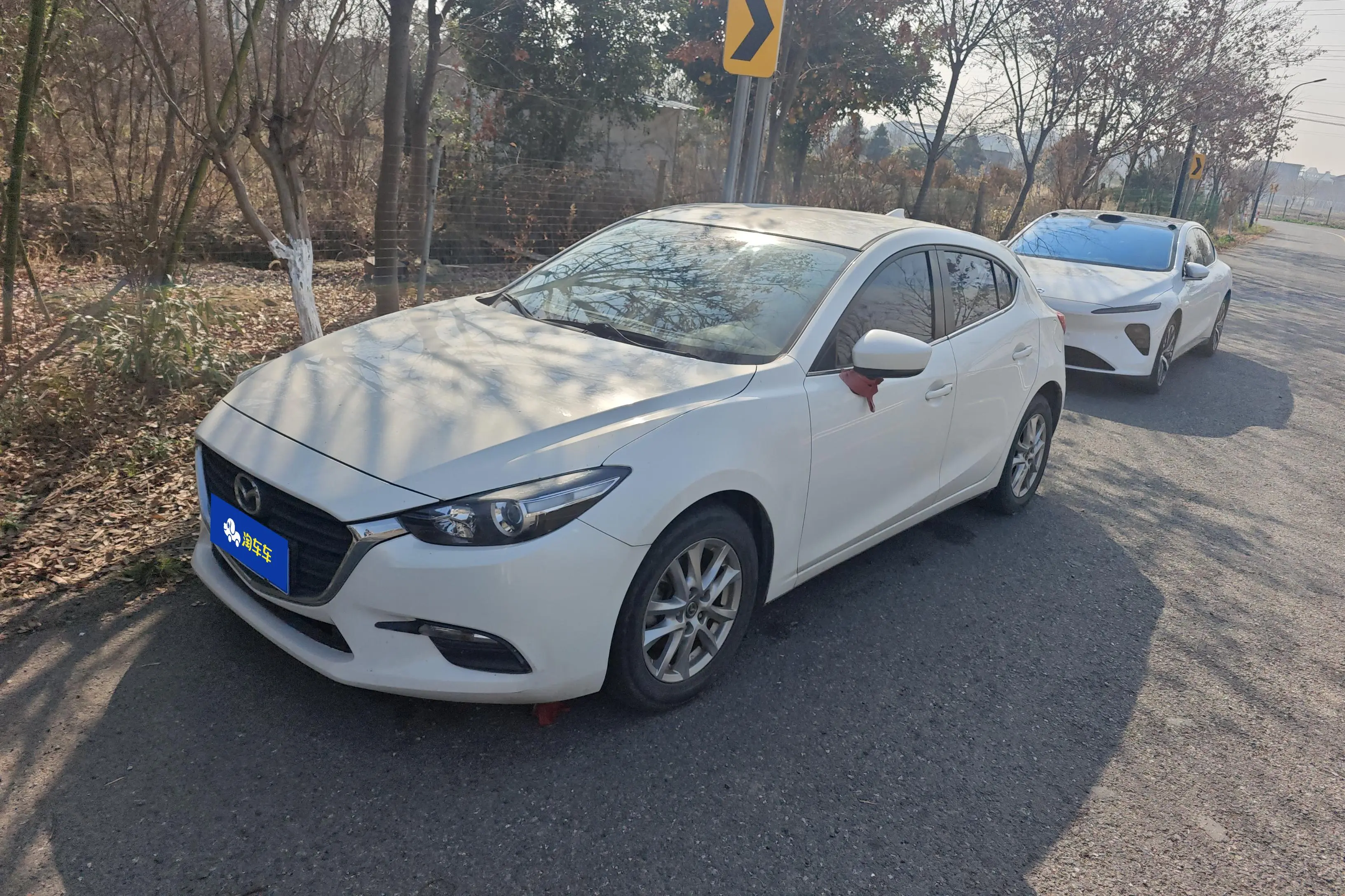 Mazda Axela (Mazda3)  из Китая