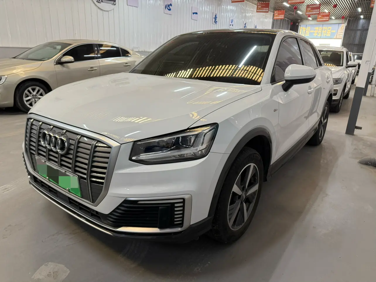 Audi Q2L e-tron  из Китая