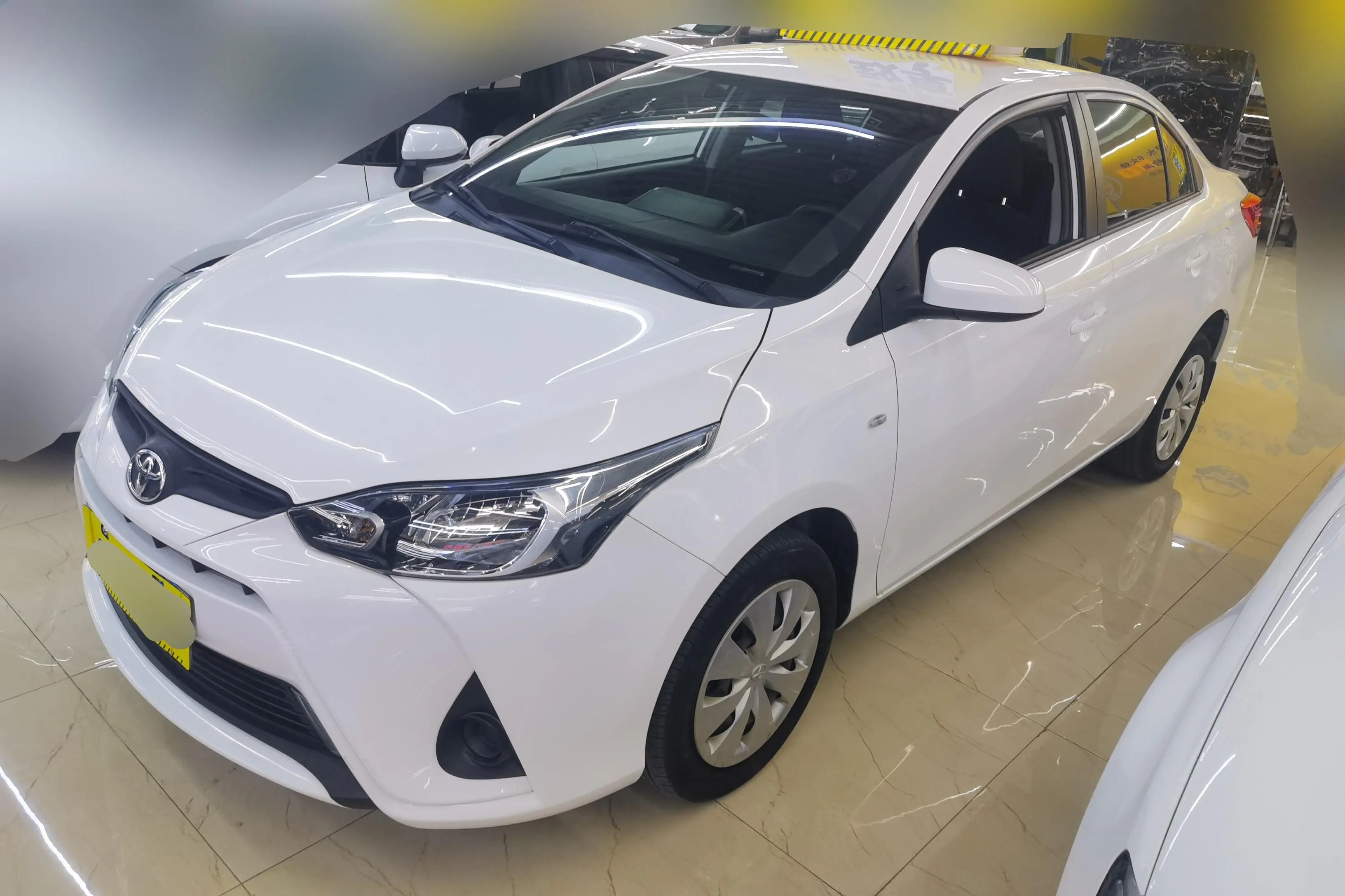 Toyota YARiS L Enjoy  из Китая
