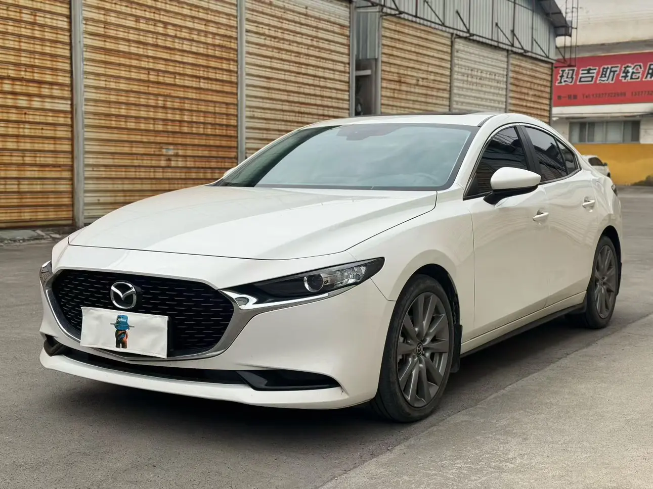 Mazda Axela (Mazda3)  из Китая