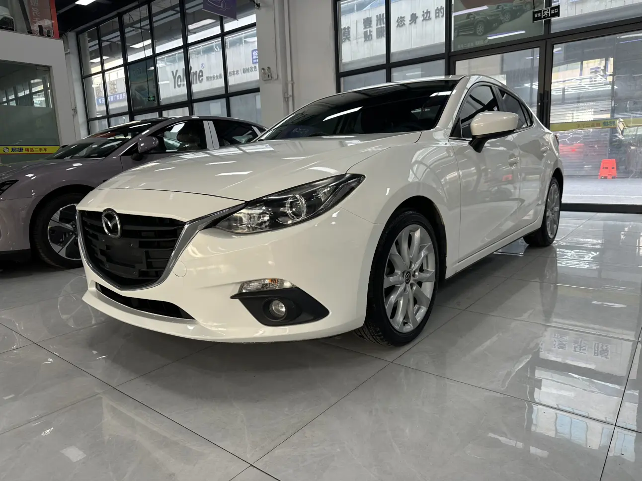 Mazda Axela (Mazda3)  из Китая