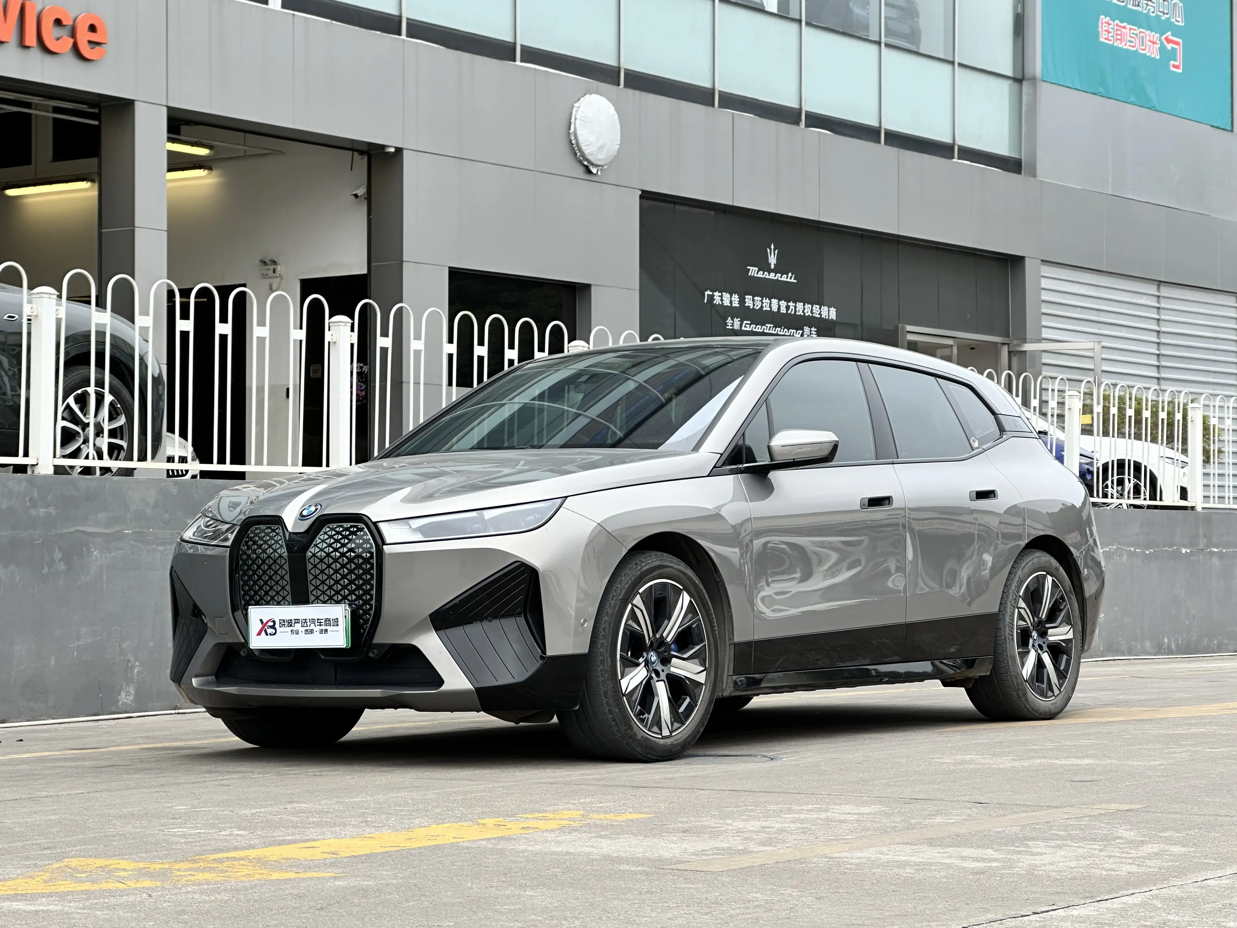 BMW iX  из Китая