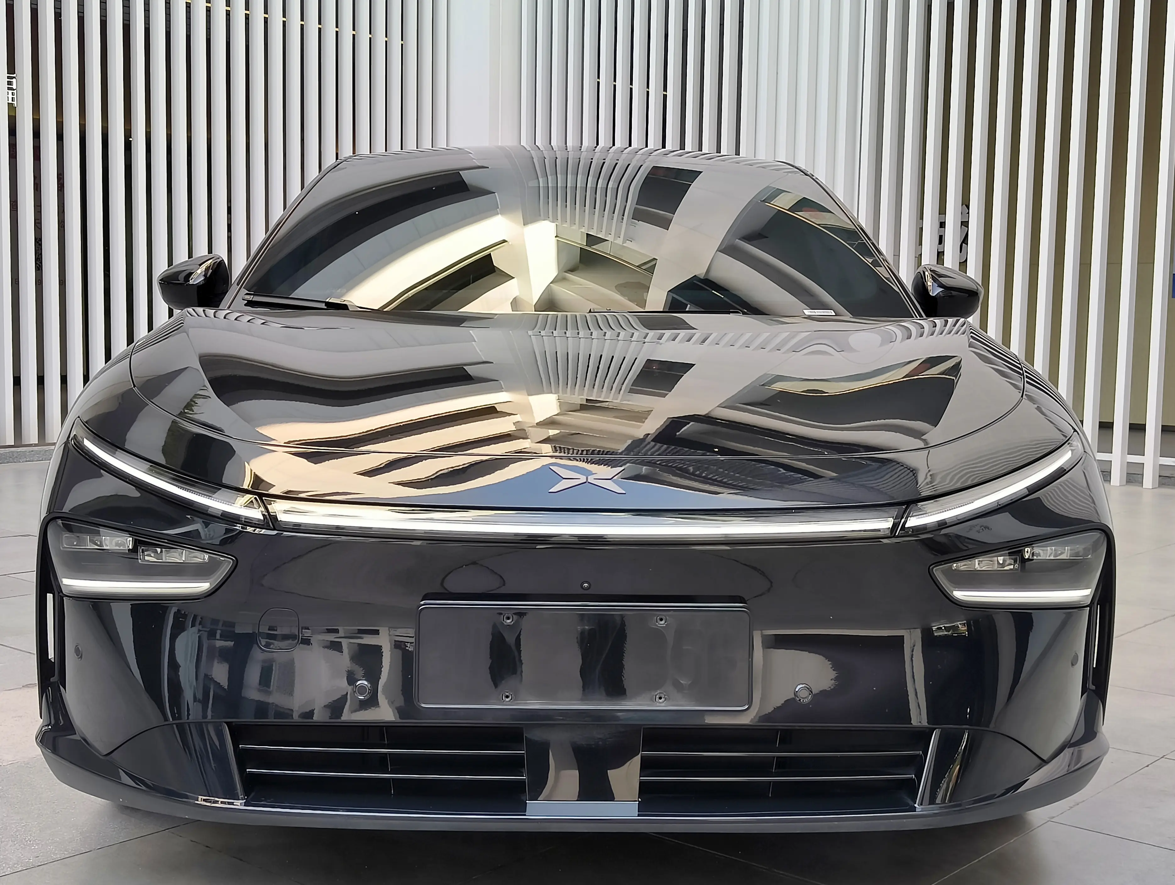 Xpeng P7+  из Китая