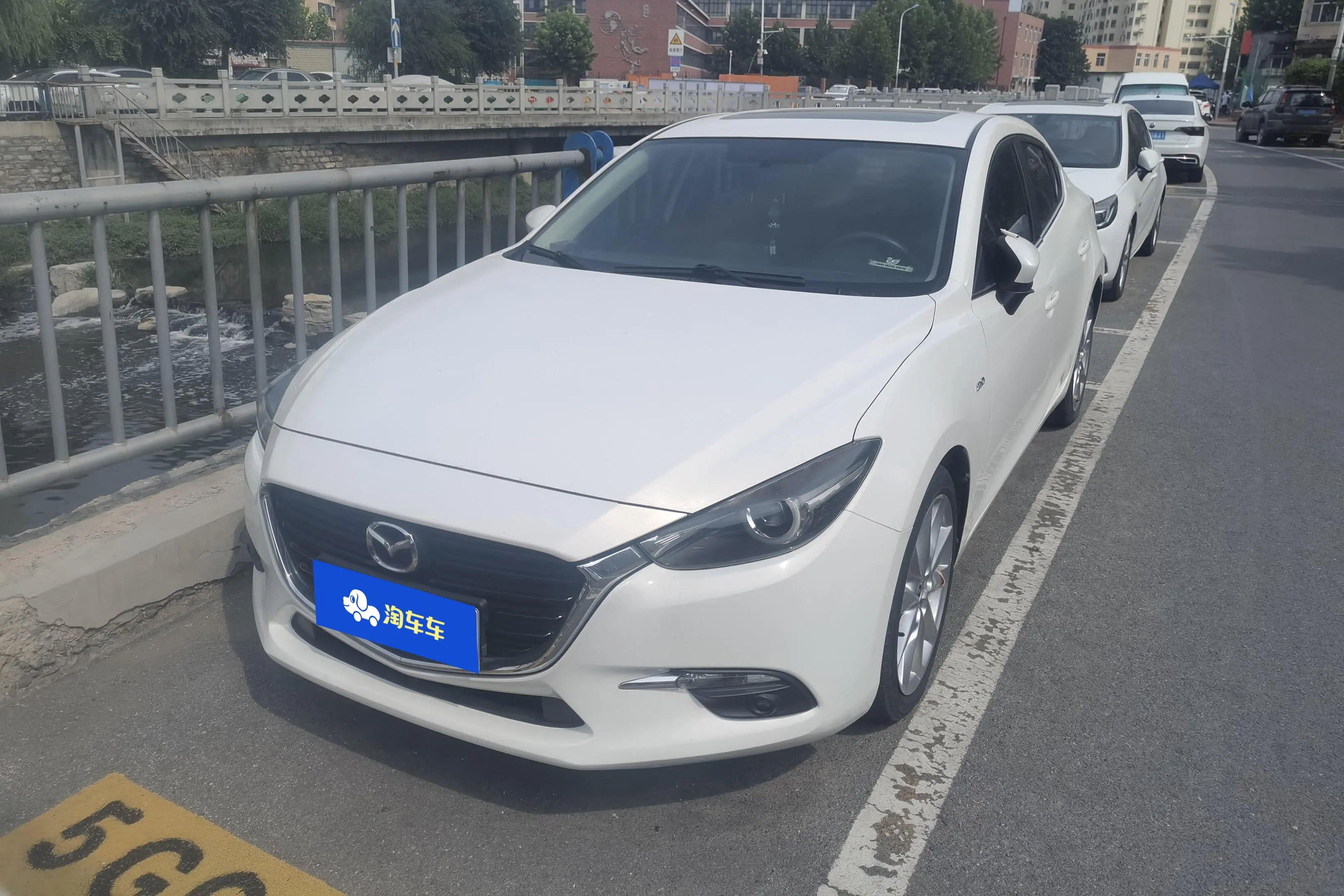 Mazda Axela (Mazda3)  из Китая