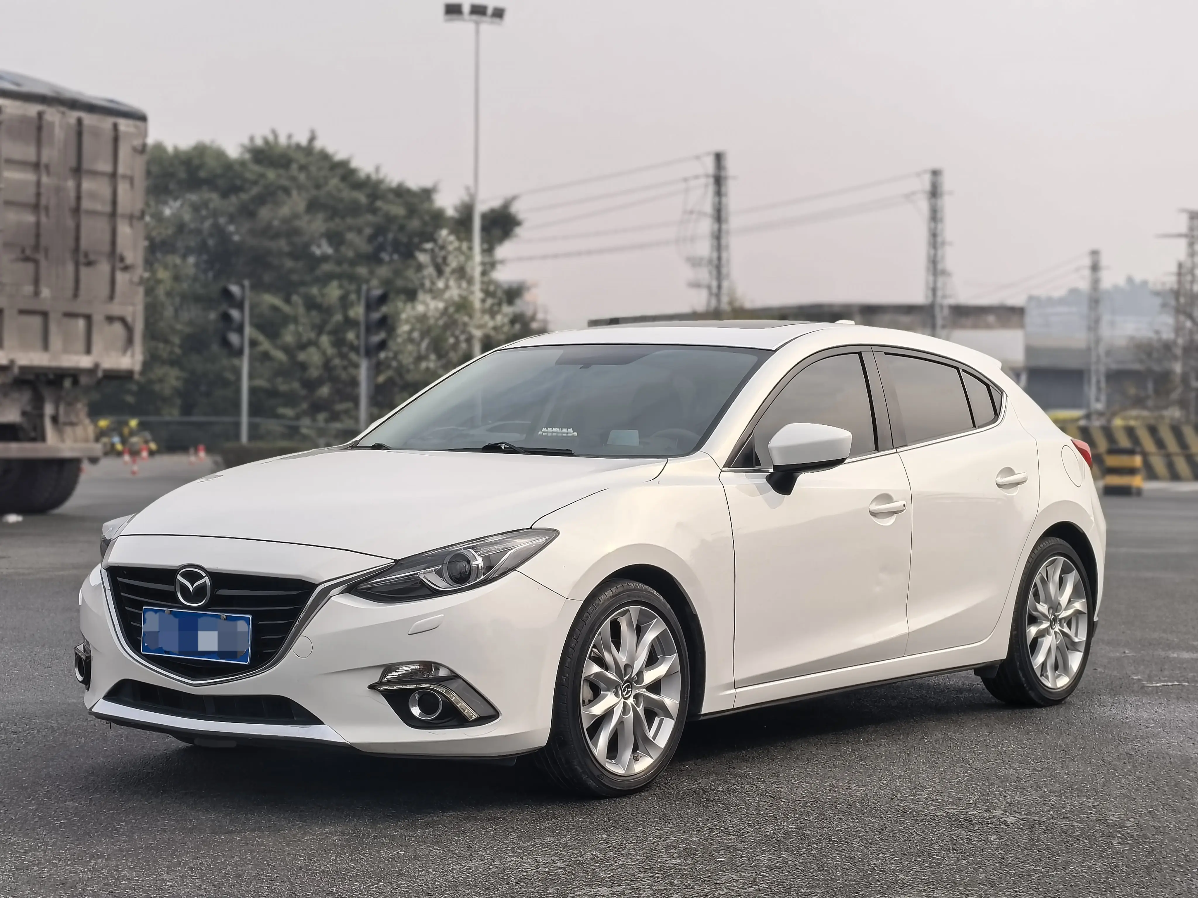 Mazda Axela (Mazda3)  из Китая