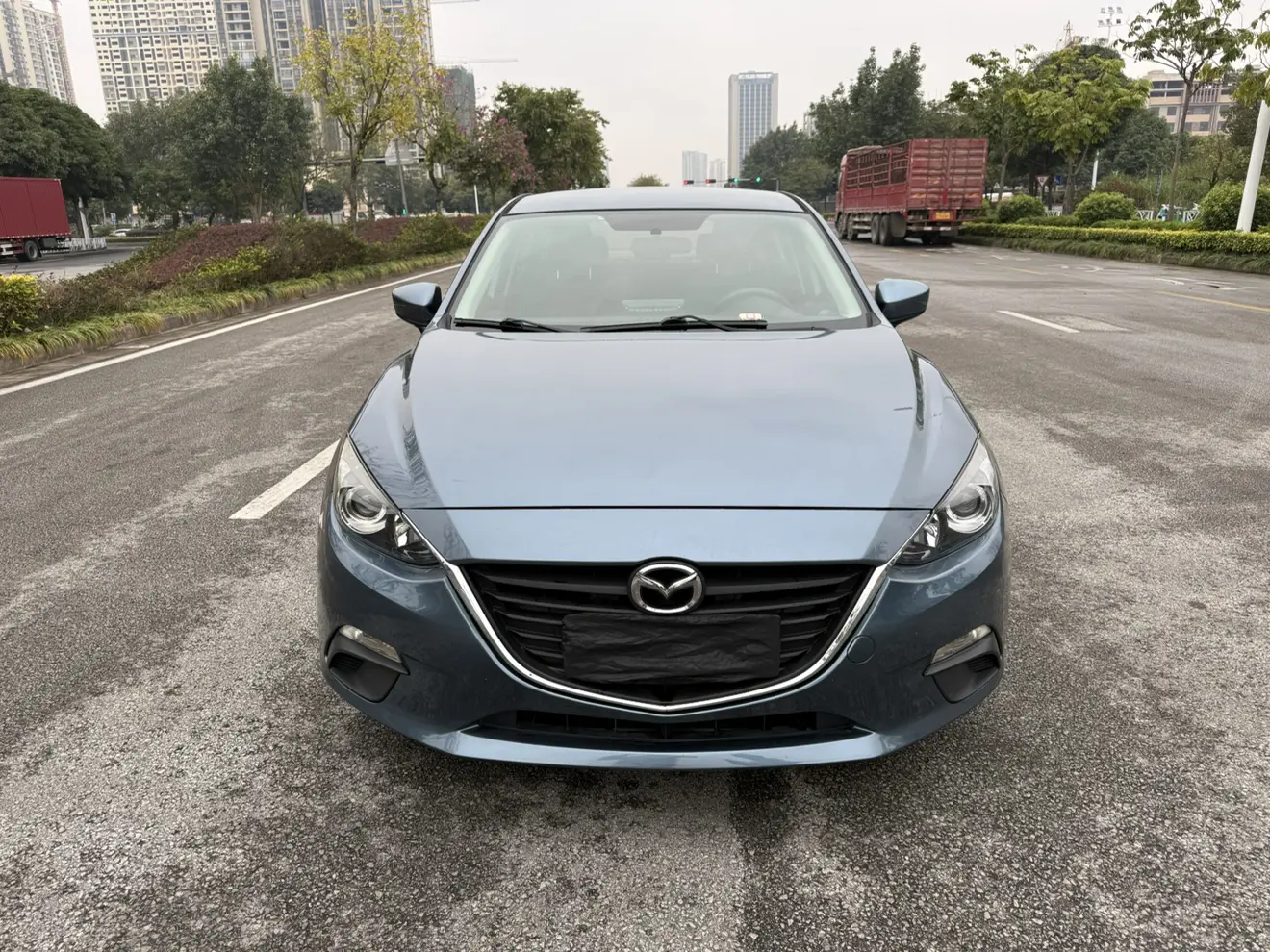 Mazda Axela (Mazda3)  из Китая