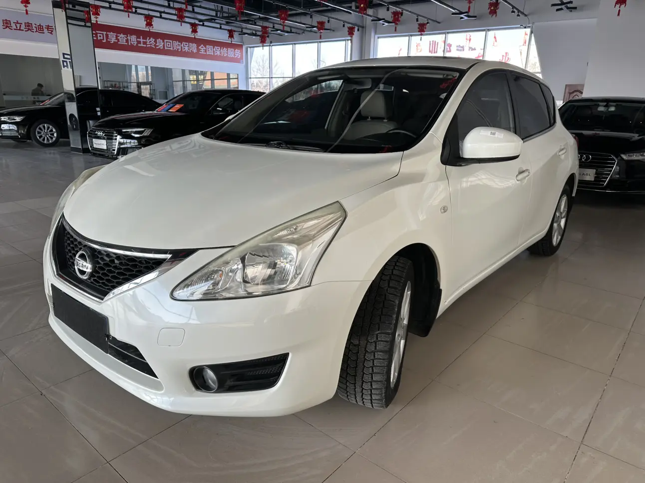 Nissan Tiida  из Китая