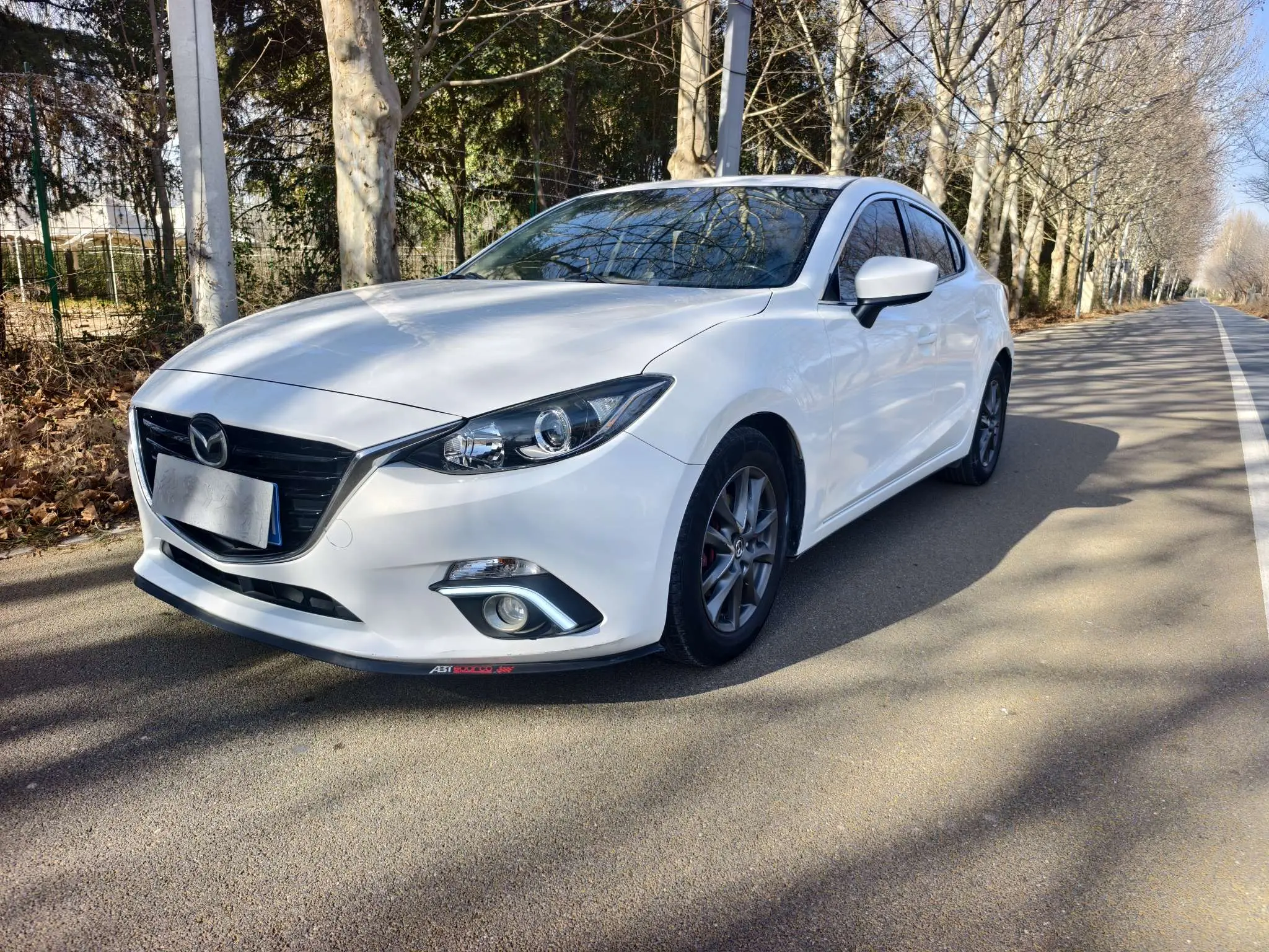 Mazda Axela (Mazda3)  из Китая