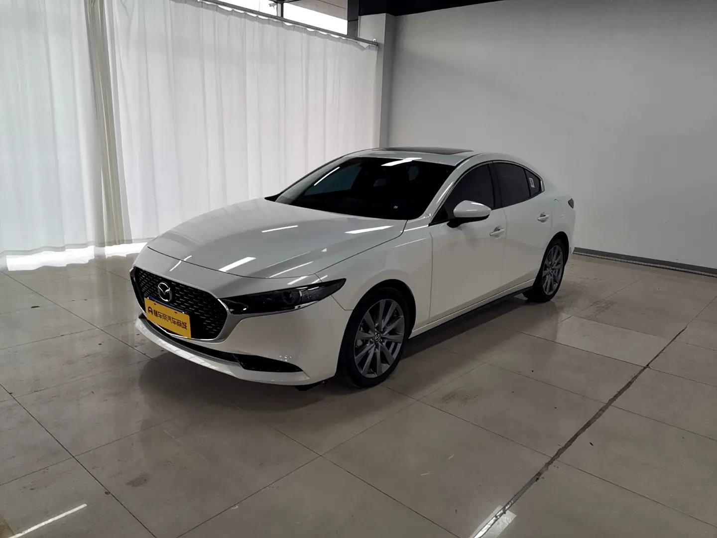 Mazda Axela (Mazda3)  из Китая