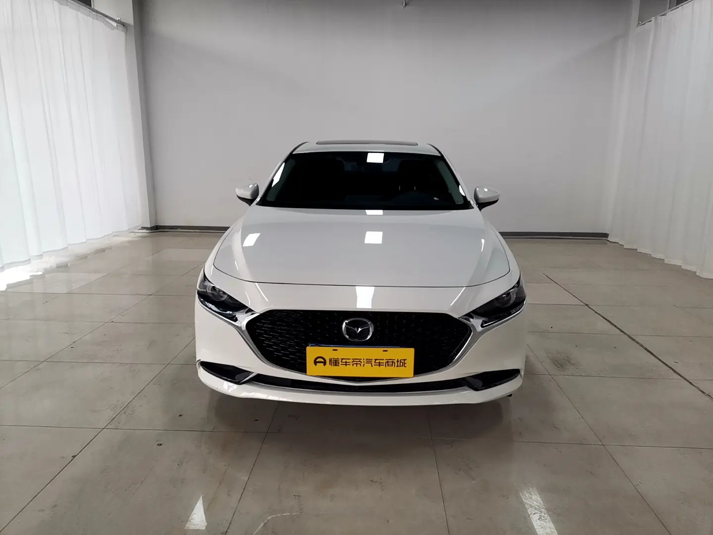 Mazda Axela (Mazda3)  из Китая