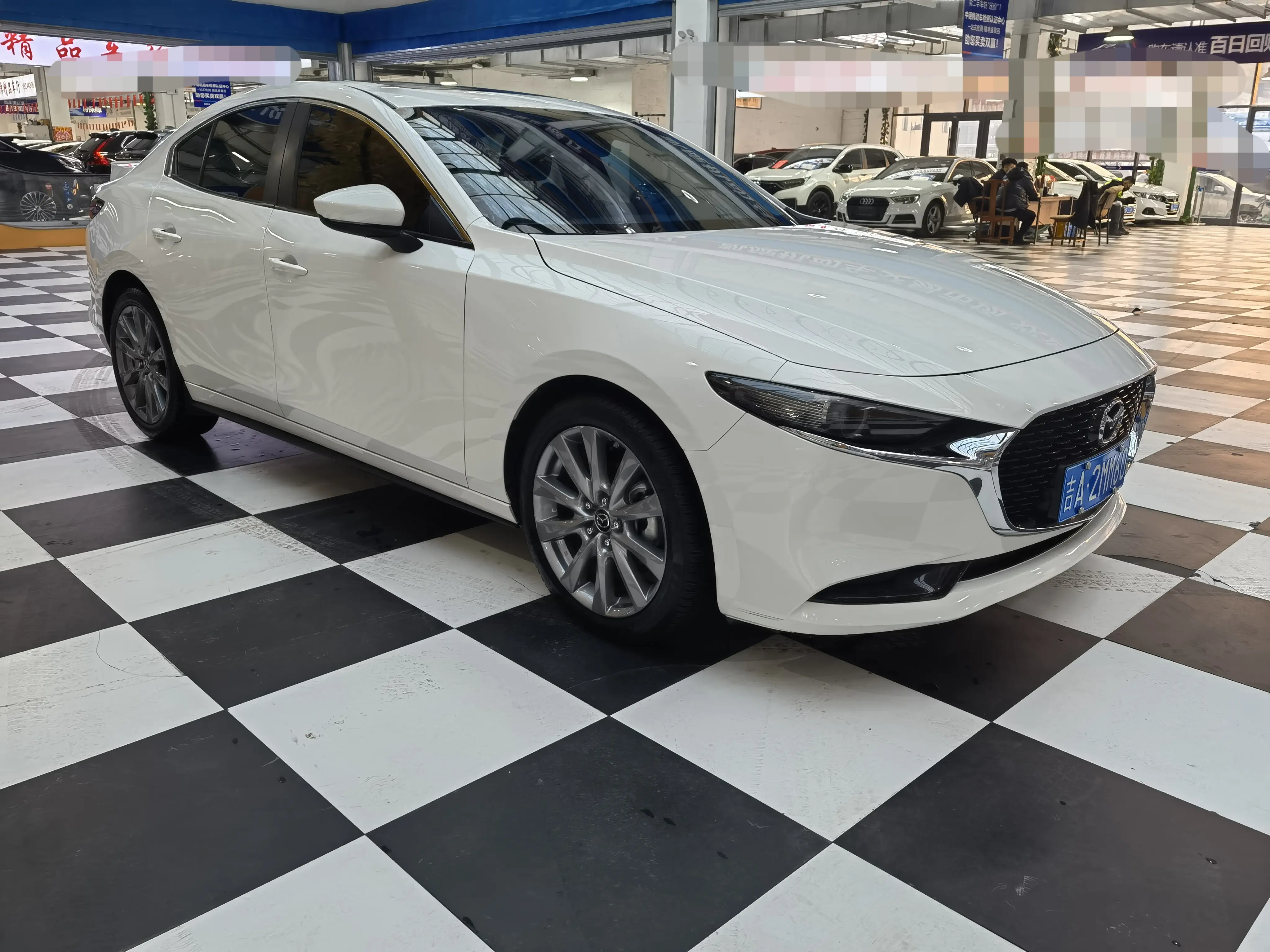 Mazda Axela (Mazda3)  из Китая