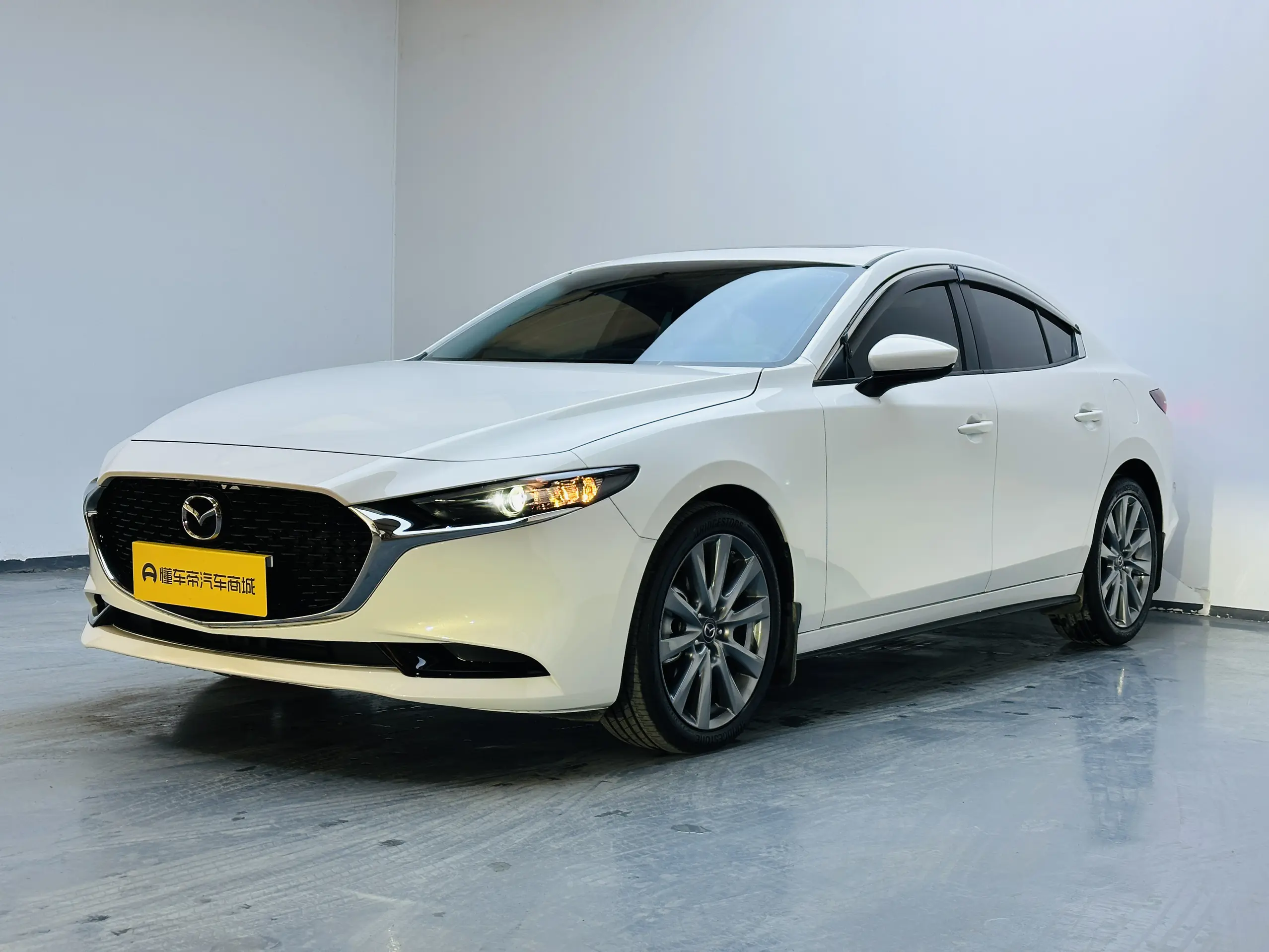 Mazda Axela (Mazda3)  из Китая