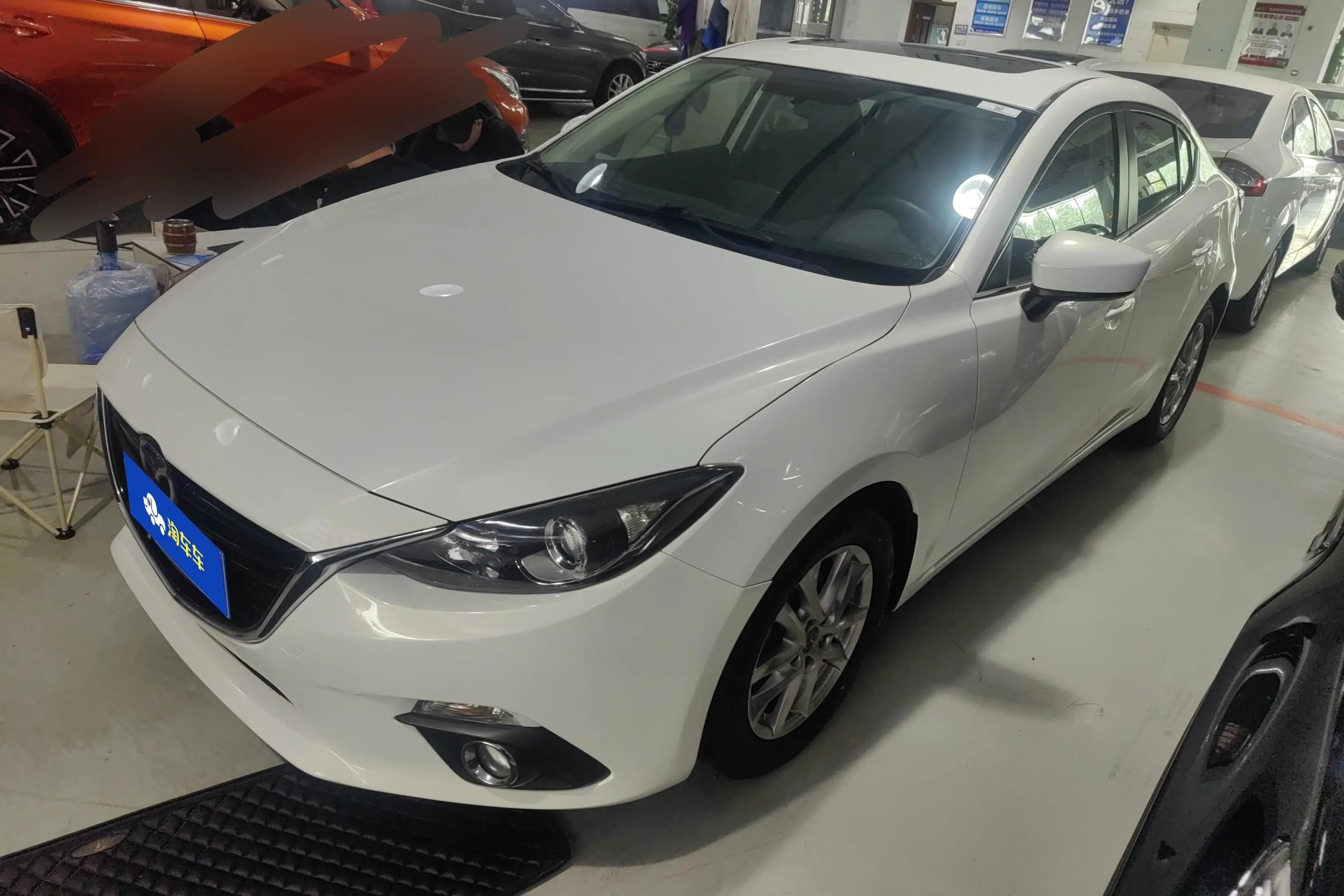 Mazda Axela (Mazda3)  из Китая