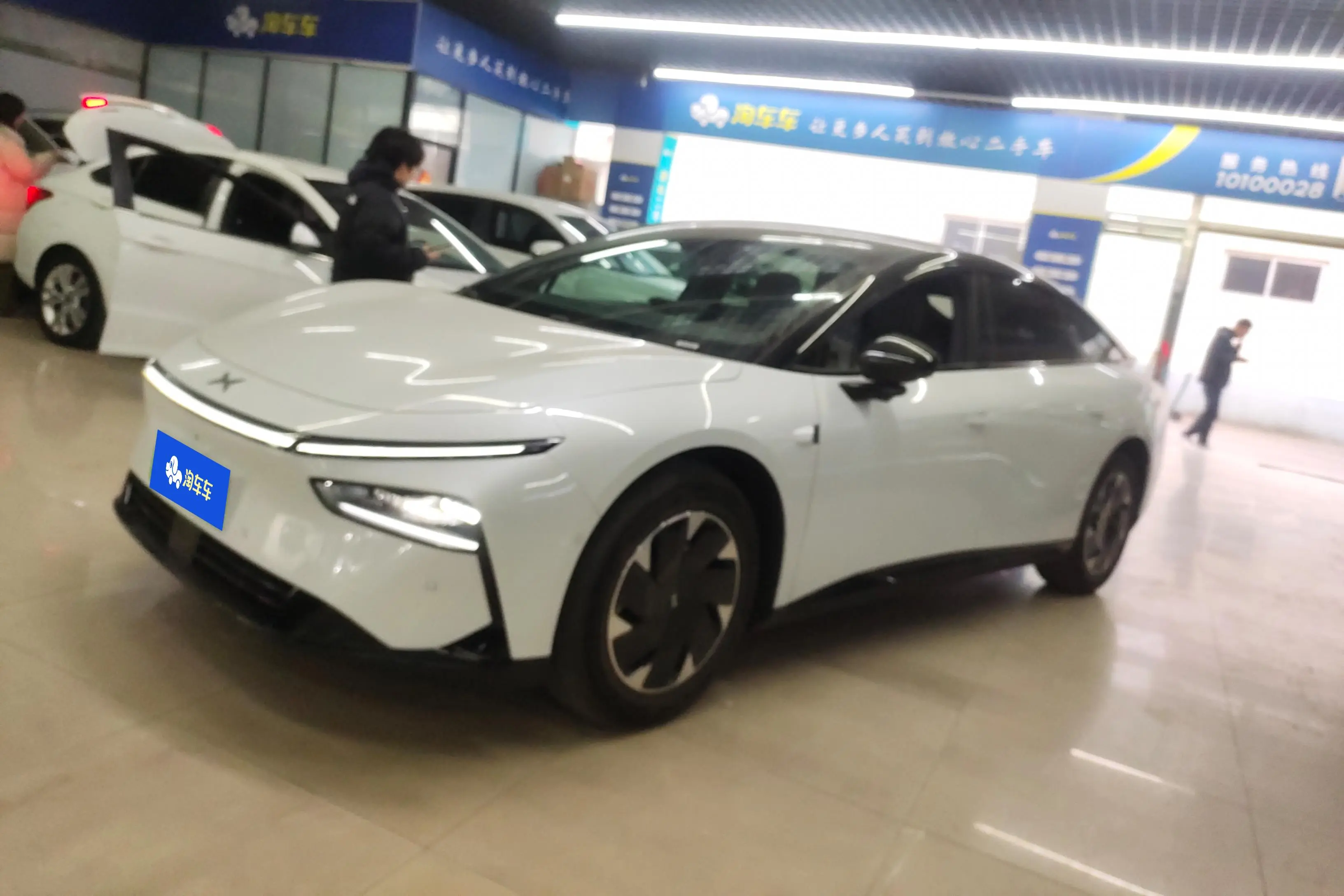 Xpeng P7+  из Китая