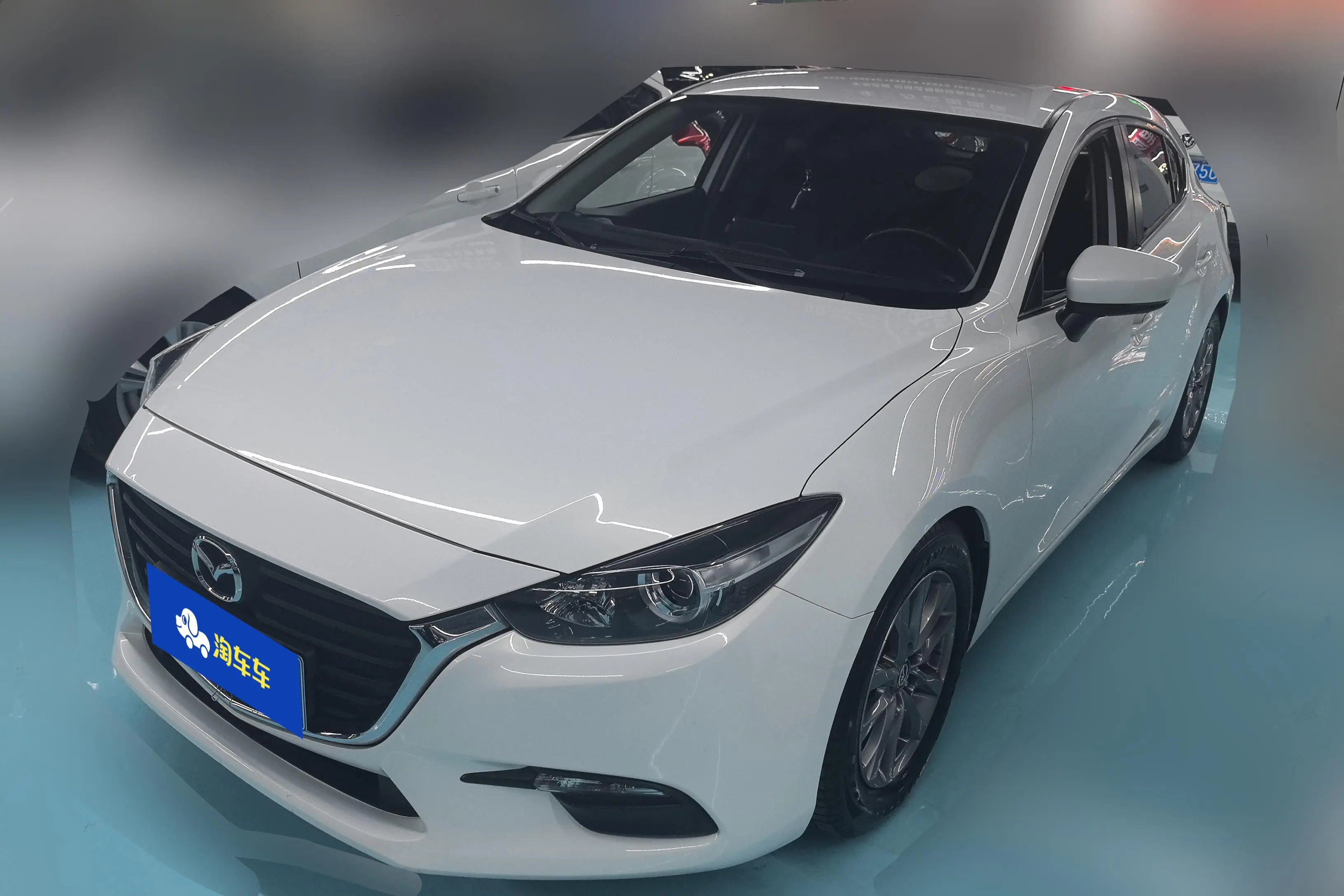 Mazda Axela (Mazda3)  из Китая