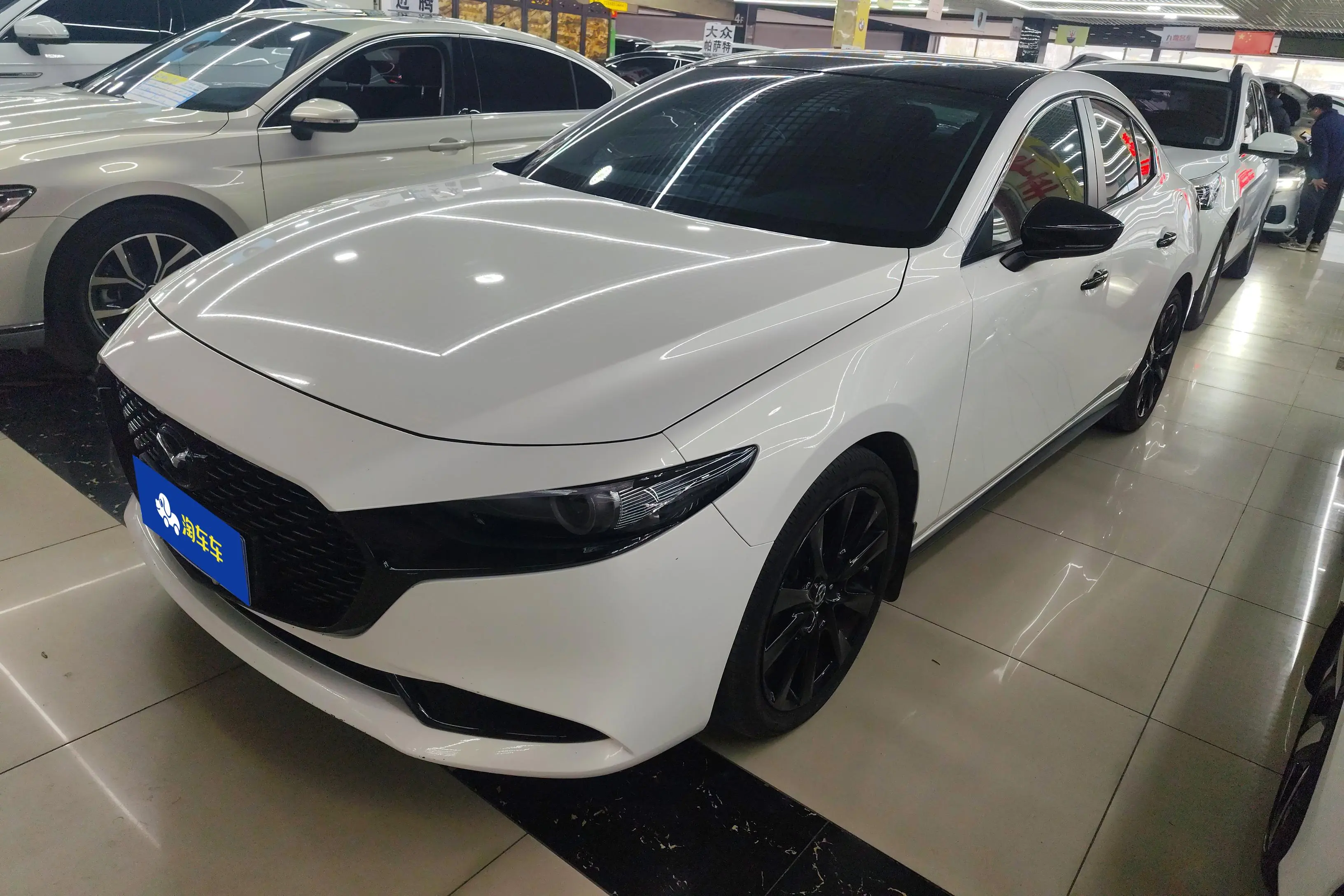 Mazda Axela (Mazda3)  из Китая
