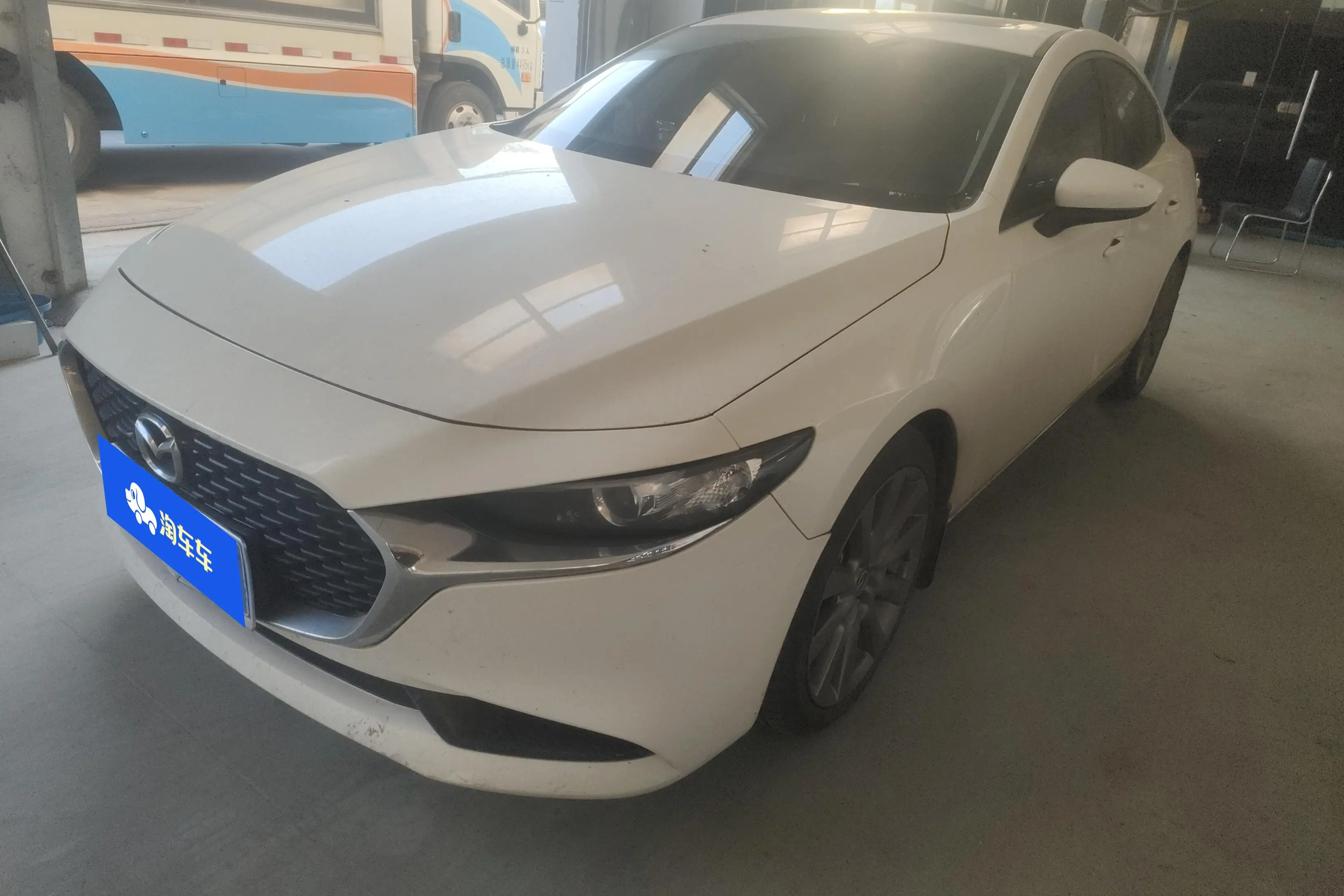 Mazda Axela (Mazda3)  из Китая