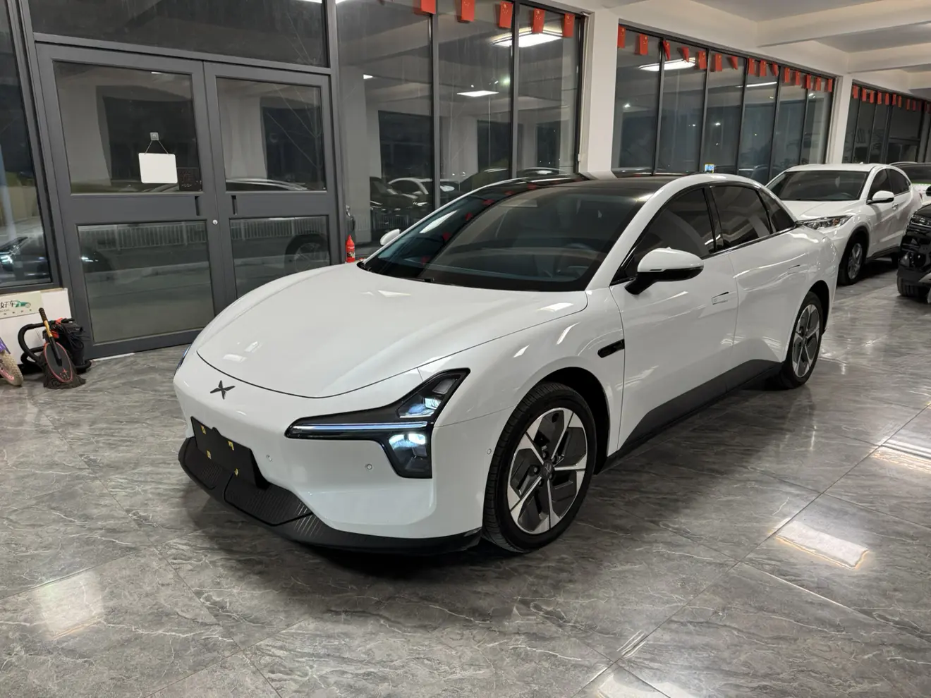 Xpeng Xiaopeng MONA M03  из Китая