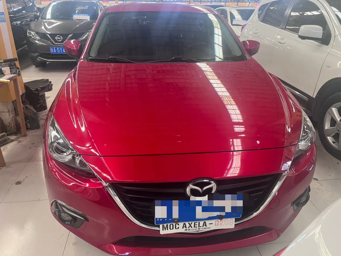 Mazda Axela (Mazda3)  из Китая