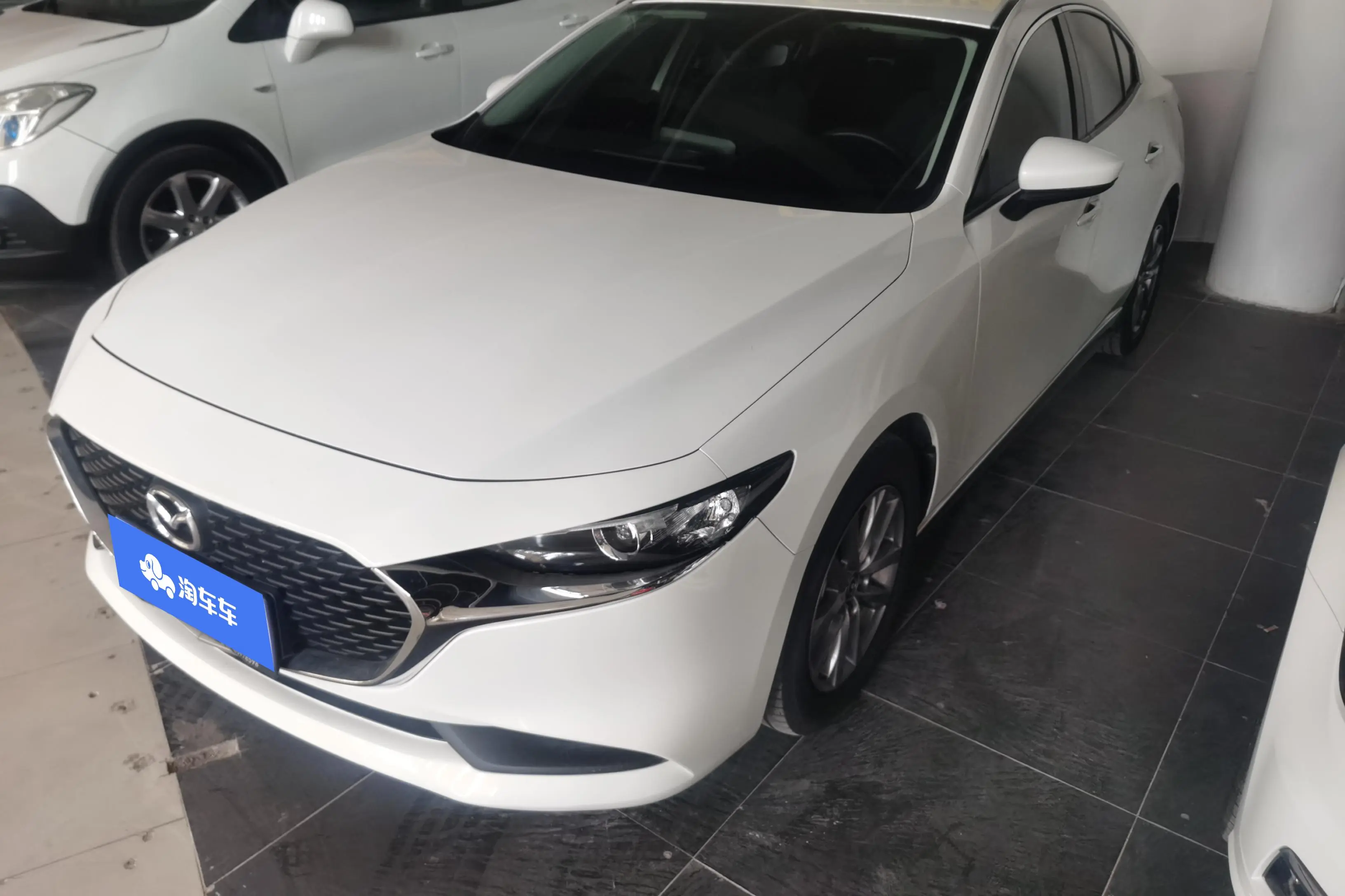 Mazda Axela (Mazda3)  из Китая