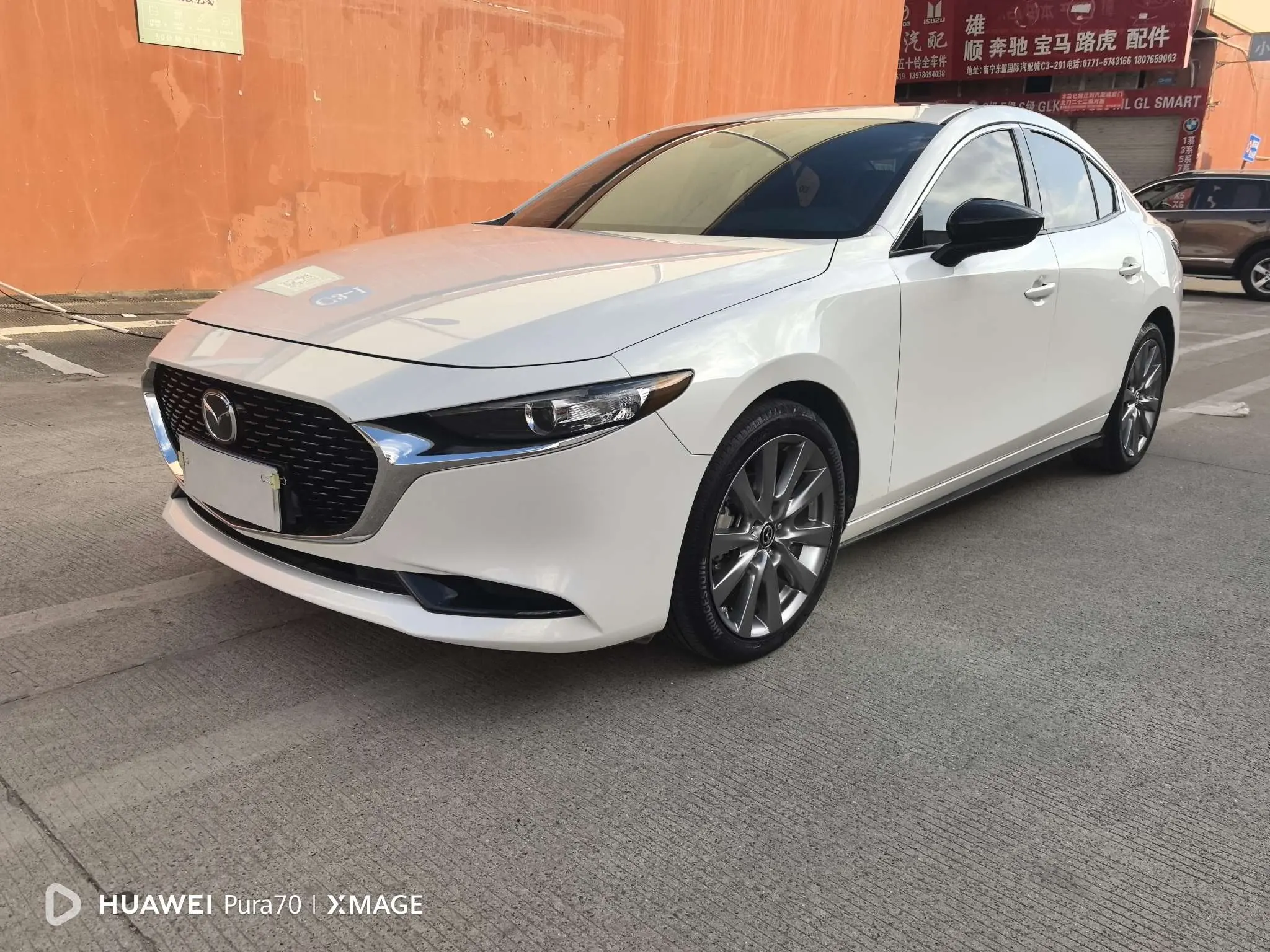 Mazda Axela (Mazda3)  из Китая