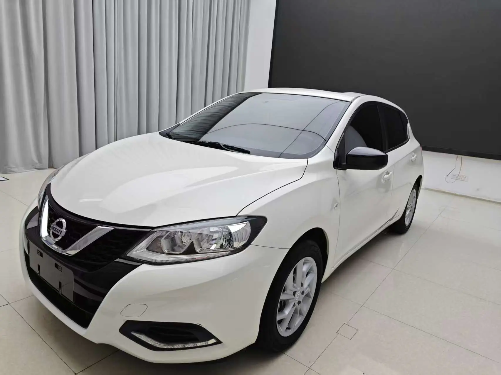 Nissan Tiida  из Китая