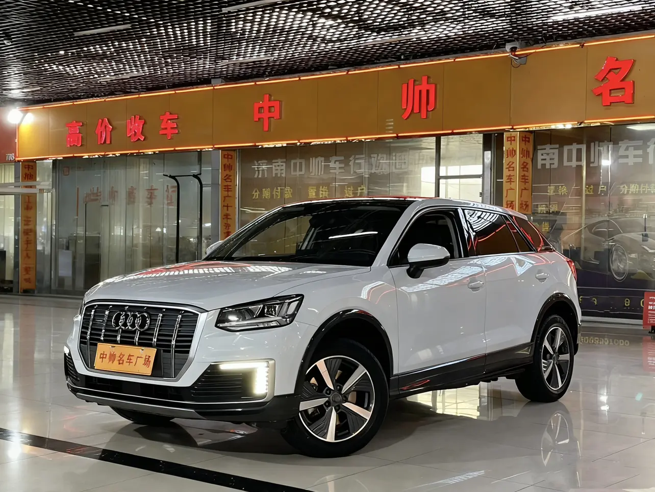 Audi Q2L e-tron  из Китая