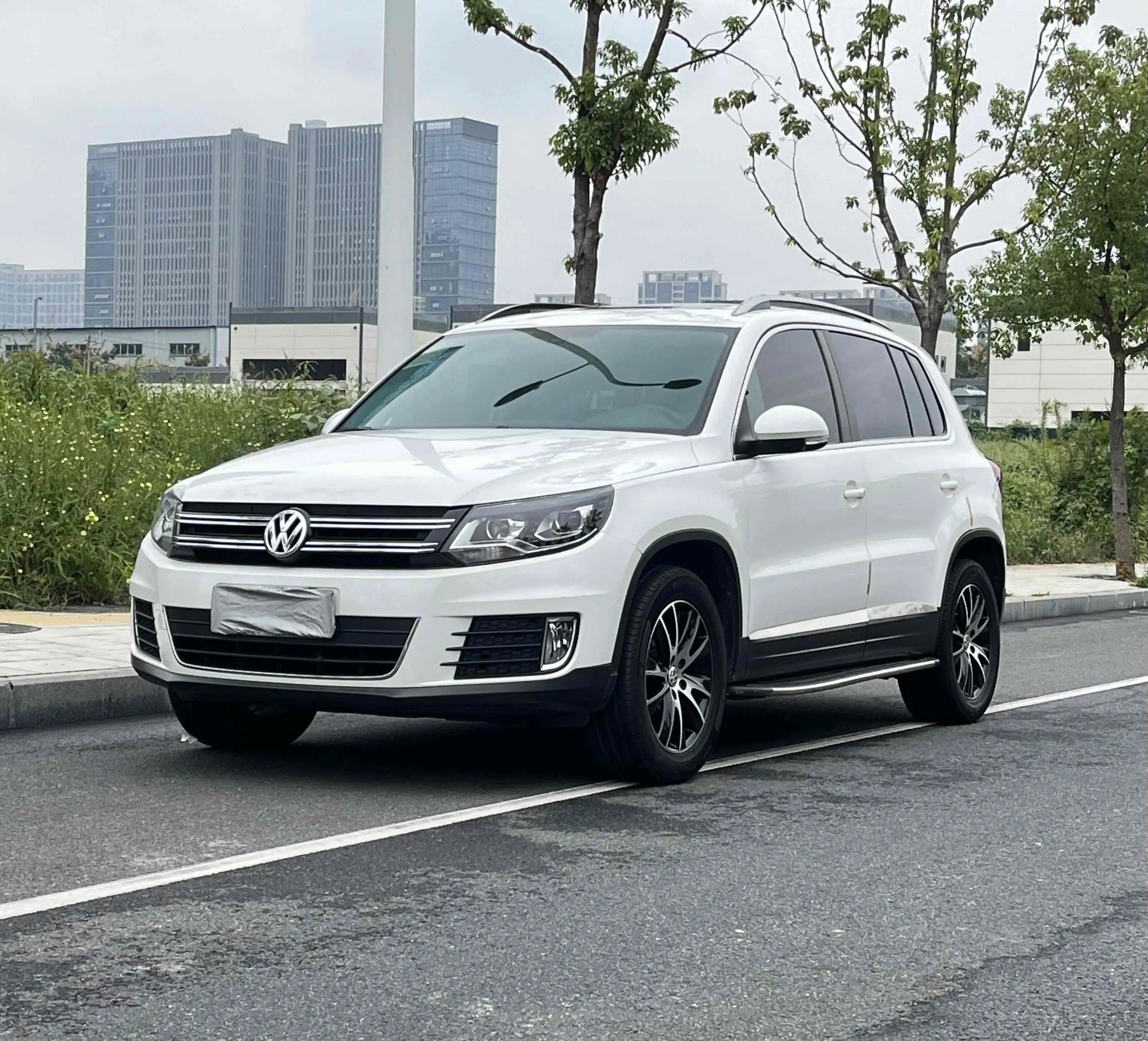 Volkswagen Tiguan (Tharu)  из Китая