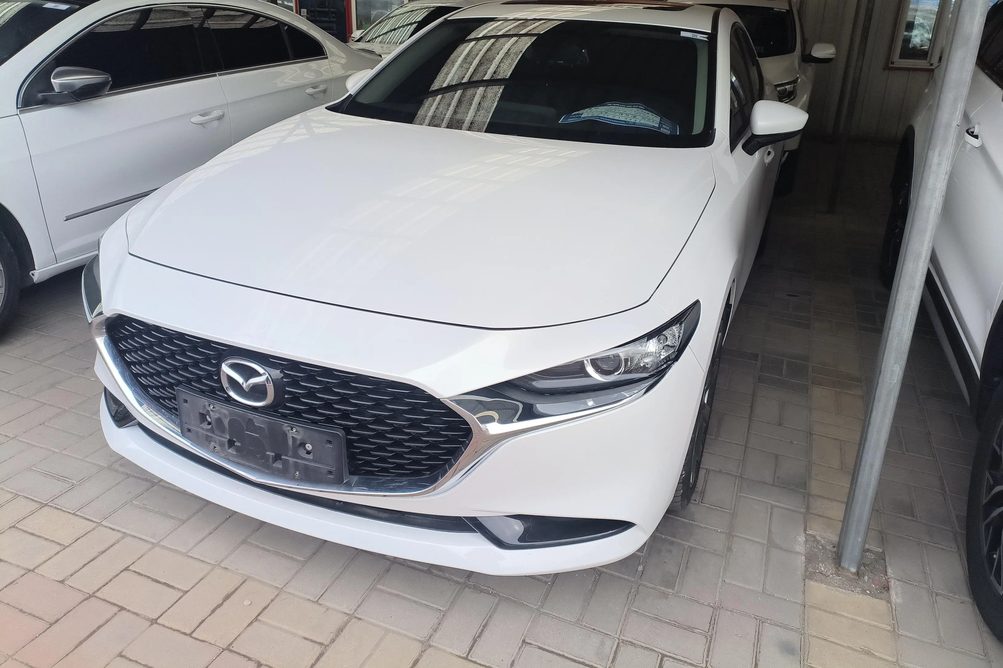 Mazda Axela (Mazda3)  из Китая
