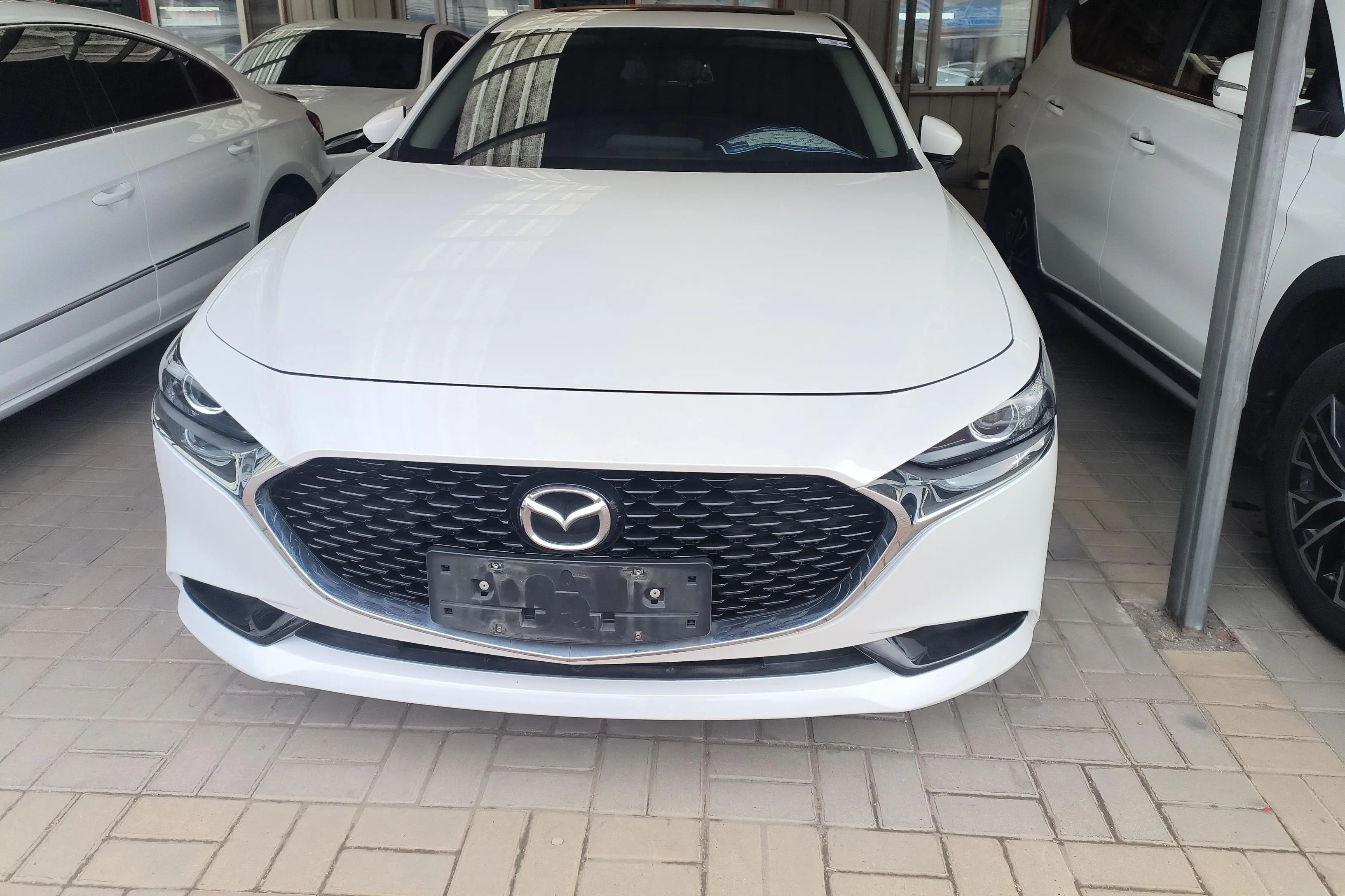 Mazda Axela (Mazda3)  из Китая