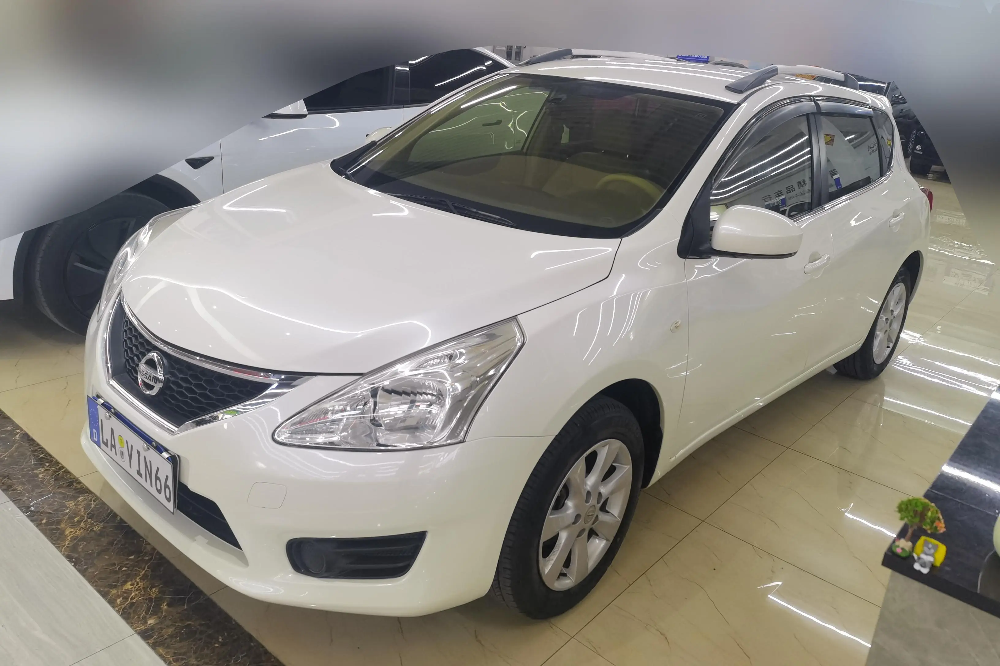 Nissan Tiida  из Китая