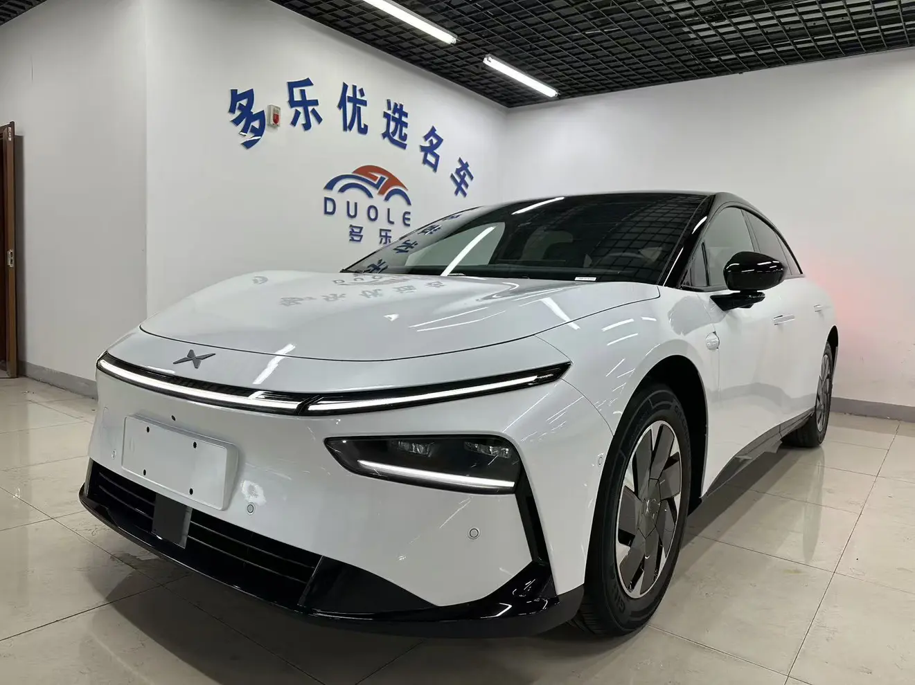 Xpeng P7+  из Китая