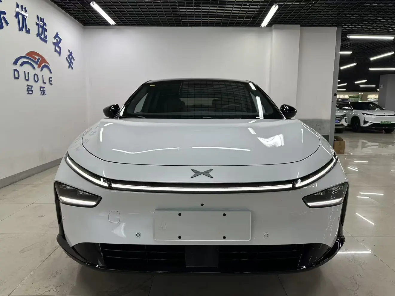 Xpeng P7+  из Китая