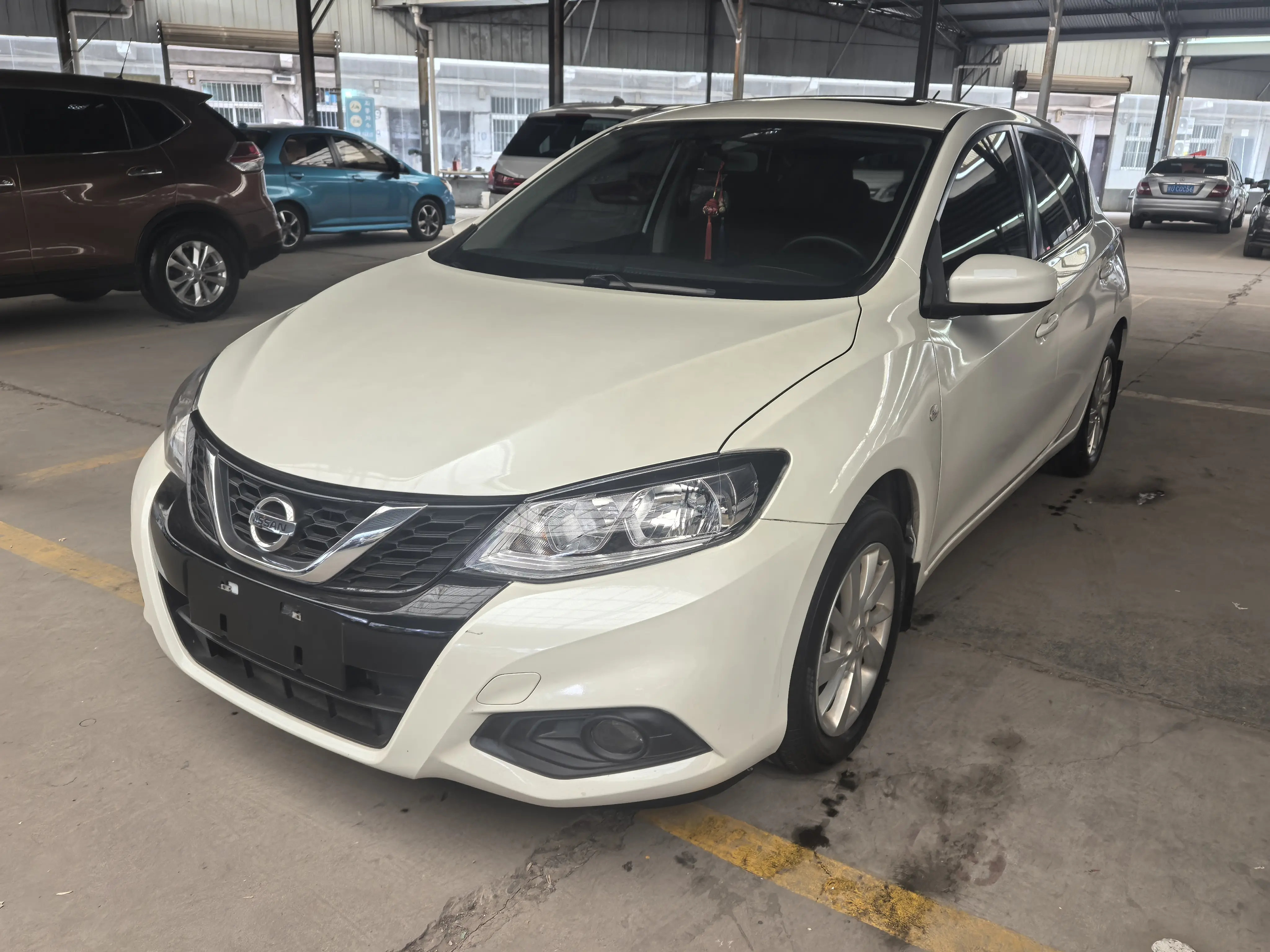 Nissan Tiida  из Китая