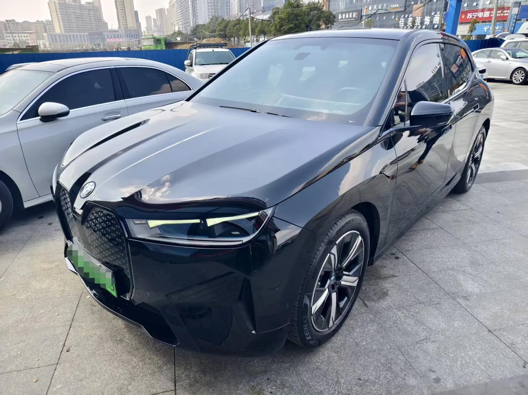 BMW iX  из Китая