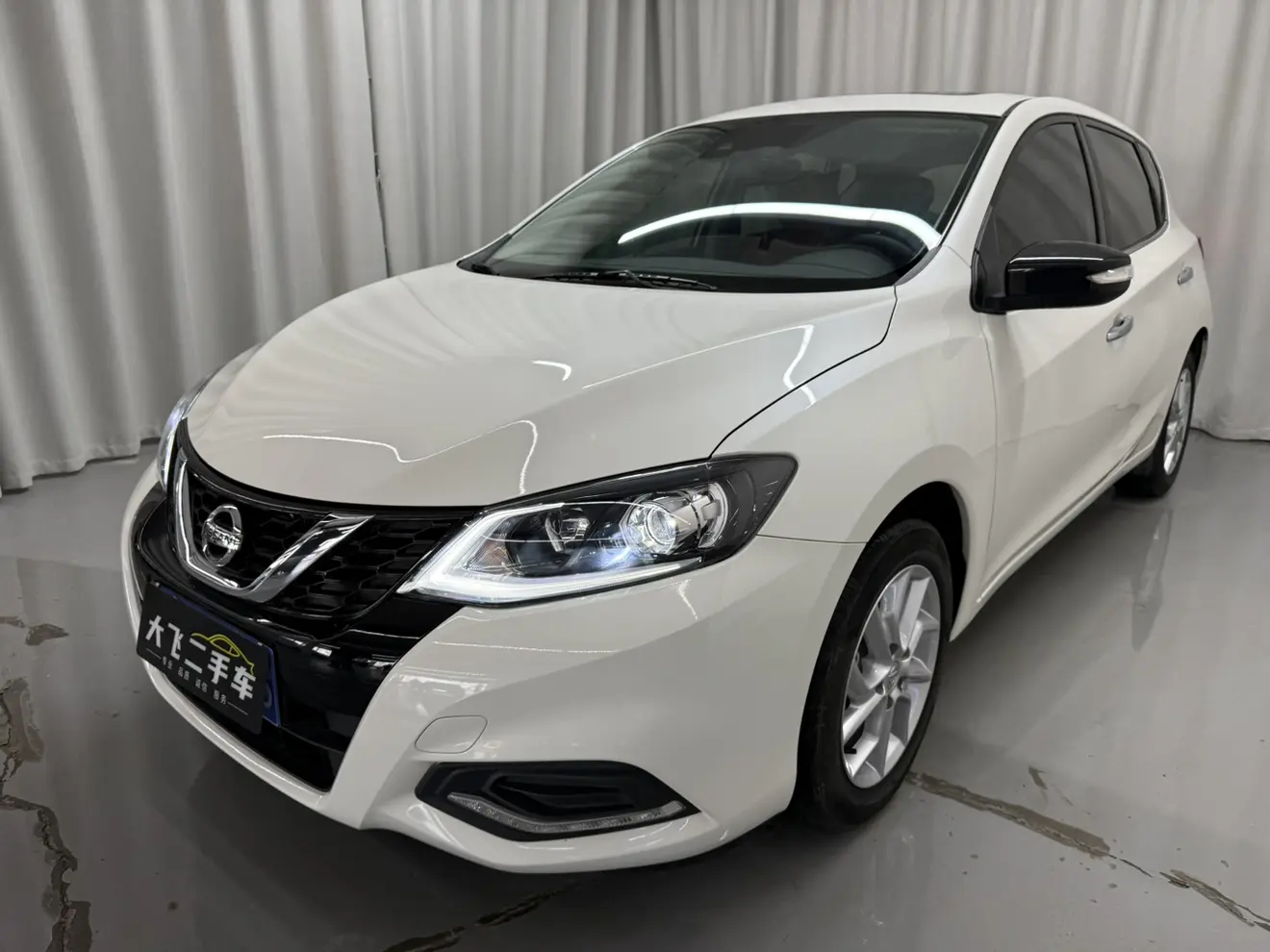 Nissan Tiida  из Китая