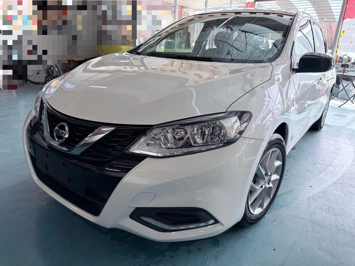 Nissan Tiida  из Китая