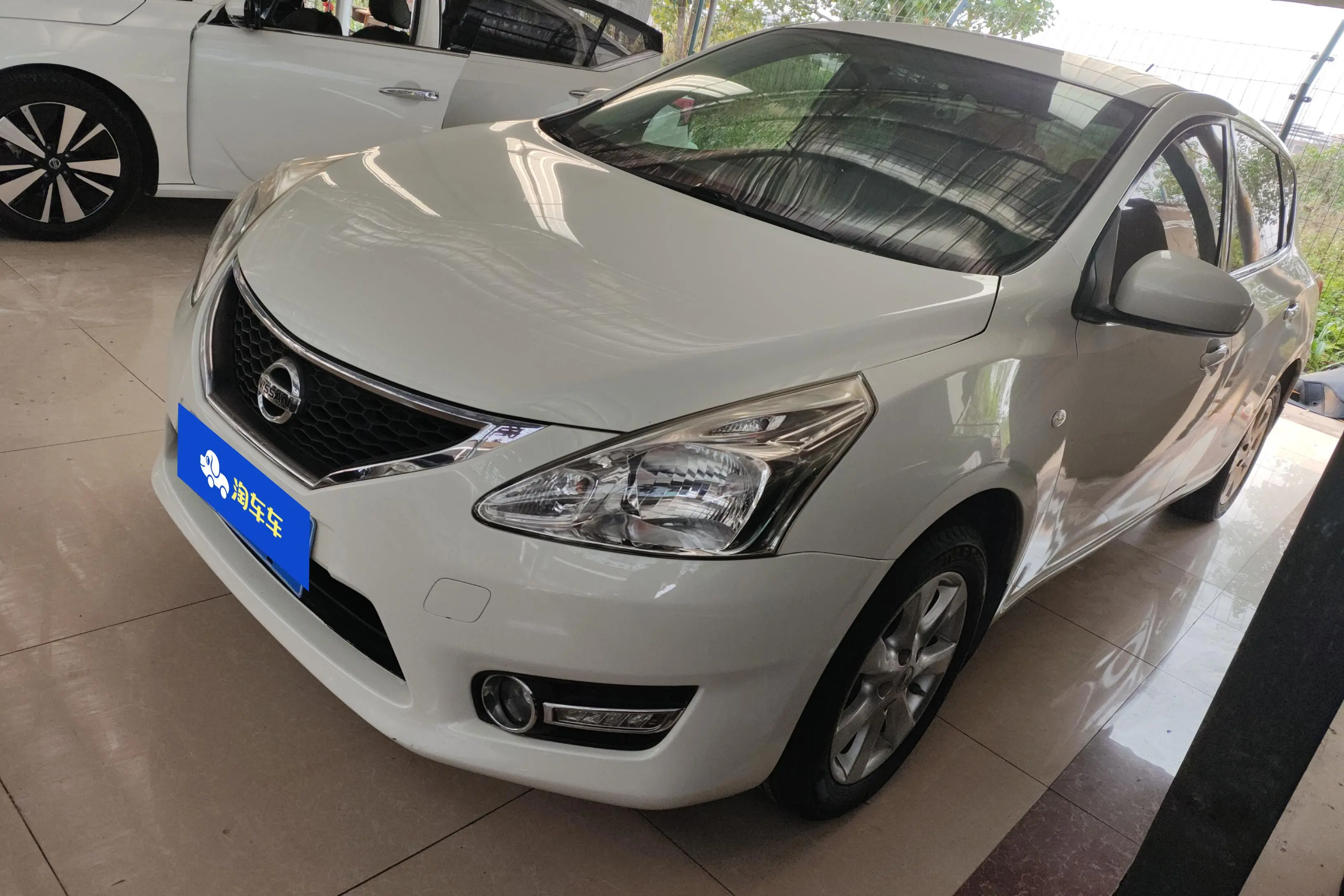 Nissan Tiida  из Китая